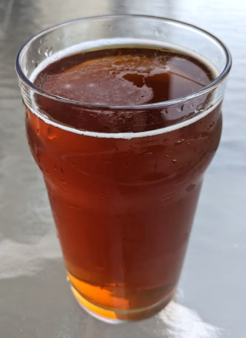 deep gold beer in clear glass